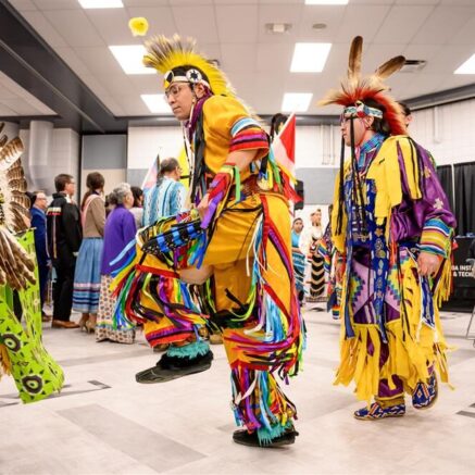 people performing during pow wow