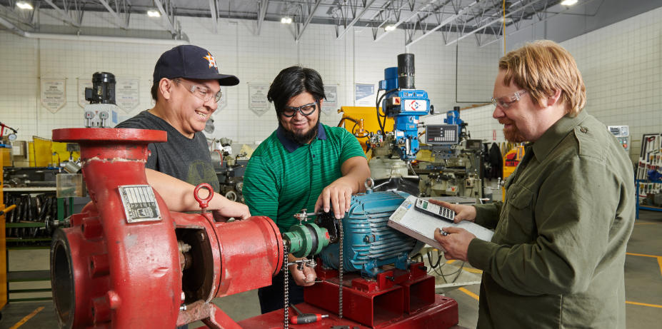 Group of men working in shop