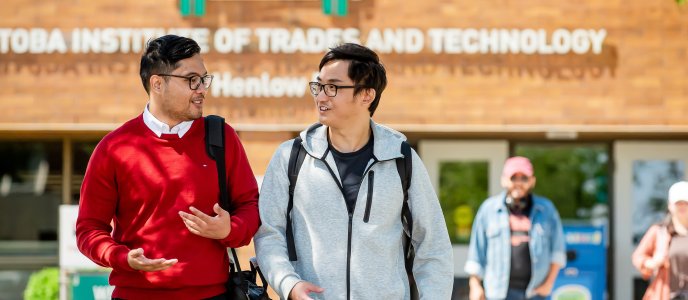 Students walking in front of the Henlow campus
