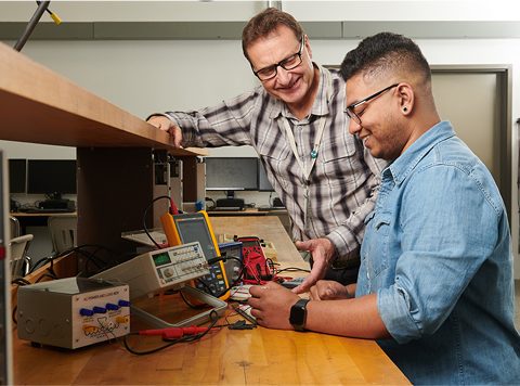Student working with devices