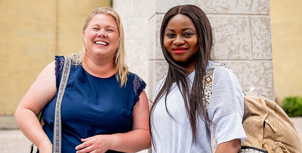 Women outside smiling