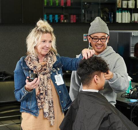 Hand on learning at MITT hairstyling