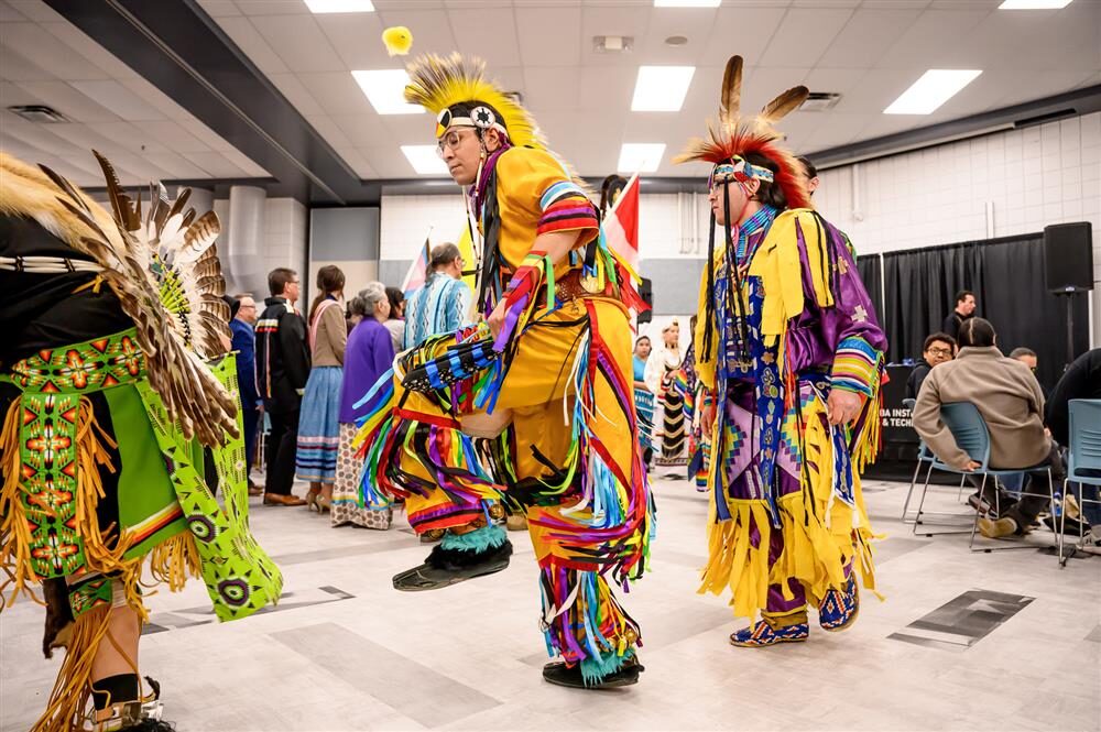 people performing during pow wow