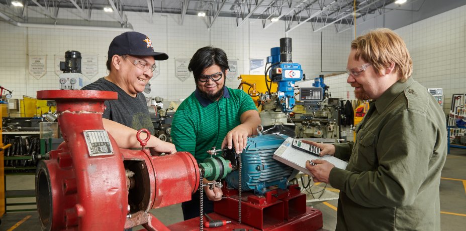 Group of men working in shop