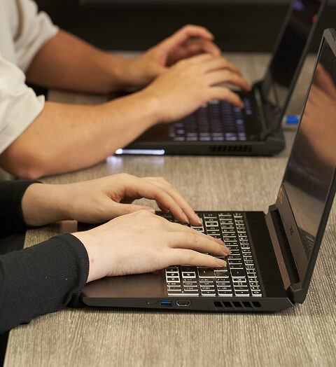 MITT Network and Systems Administrator Program Students on Laptops
