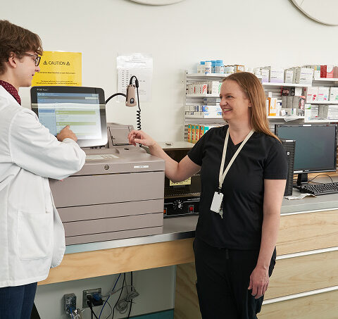 Pharmacy Technician program instructor leading a student